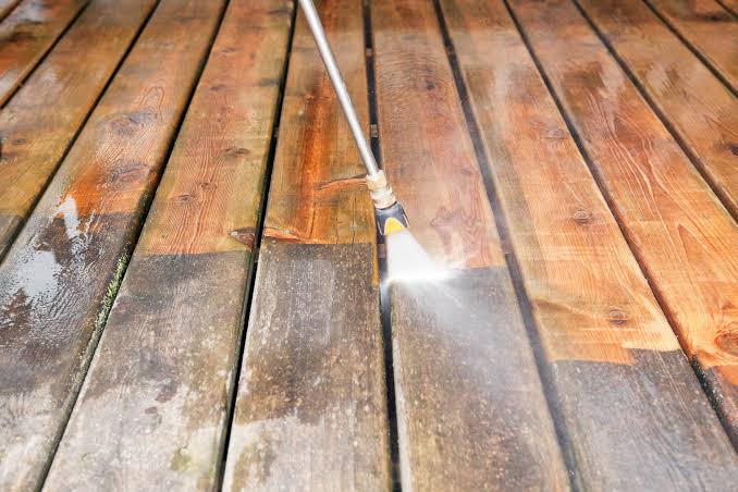 What should we pay attention to when using a pressure washer?